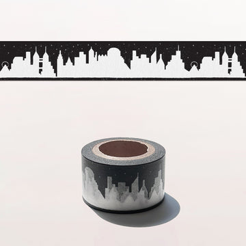 Roll of tape with a cityscape design on a white background