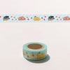 Roll of decorative tape with cat designs on a light pink background