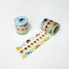 Three rolls of decorative tape with animal and acorn illustrations on a white background