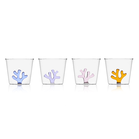 Four clear glass tumblers with colorful coral designs on a white background