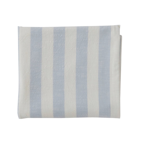 Light-blue and white striped rectangular tablecloth laid flat, with the fabric’s linen-like texture visible