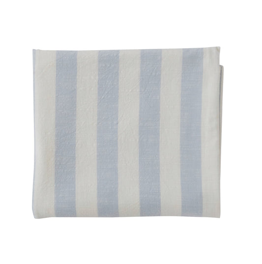 Light-blue and white striped rectangular tablecloth laid flat, with the fabric’s linen-like texture visible
