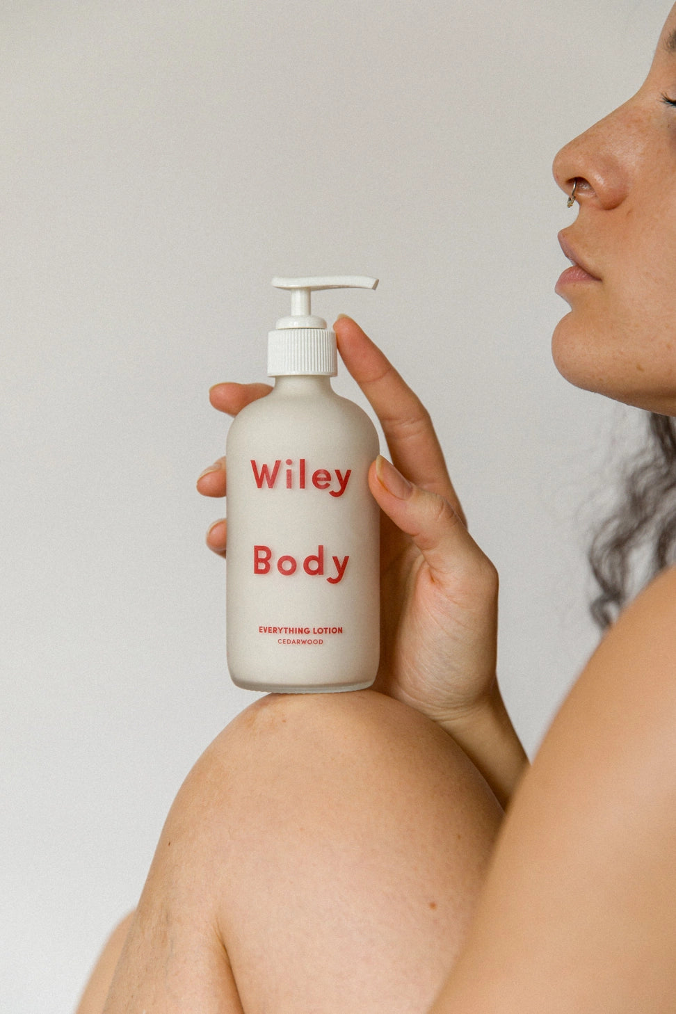 Woman holding a lotion