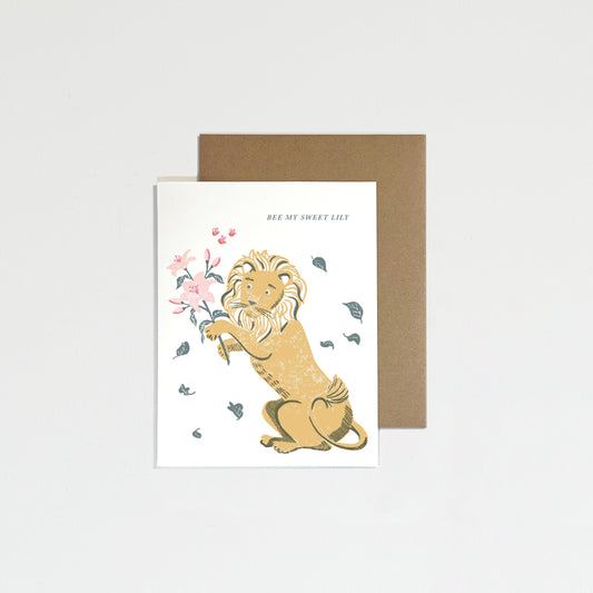 Greeting card with a lion design and floral elements on a white background
