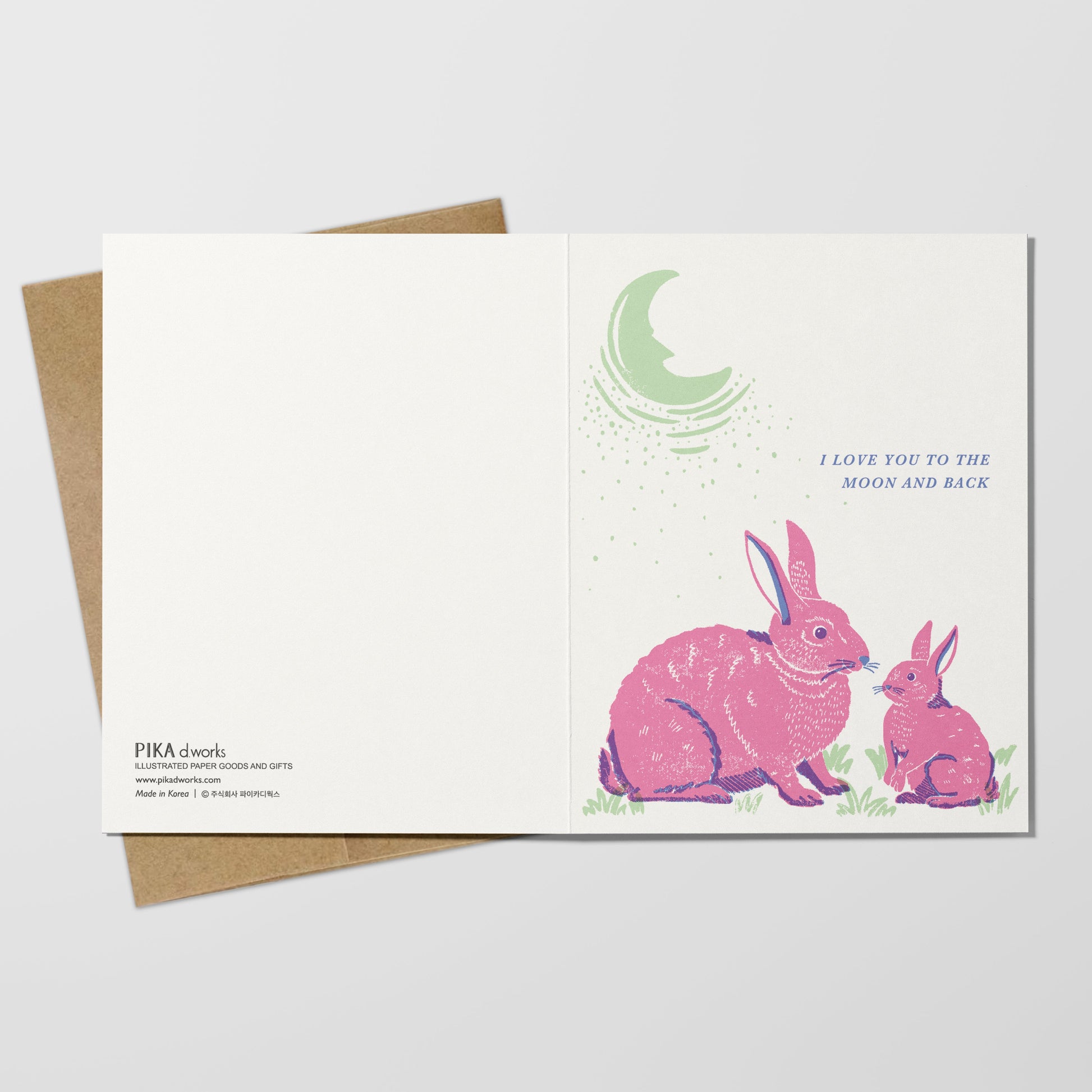 Greeting card with pink bunnies and a green moon on a white background