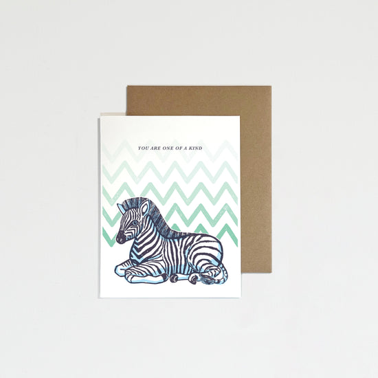 Greeting card with zebra illustration on a white background