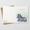 Greeting card with zebra illustration on a white background