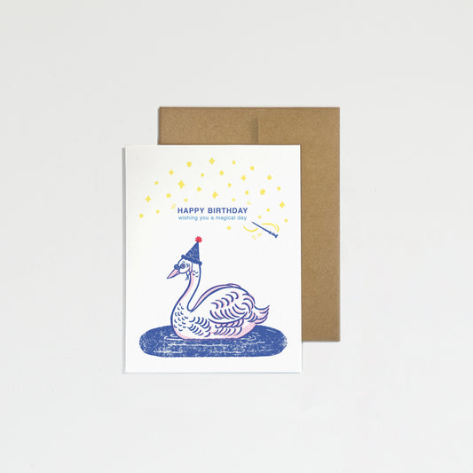 Greeting card with a swan design and 'Happy Birthday' text on a white background