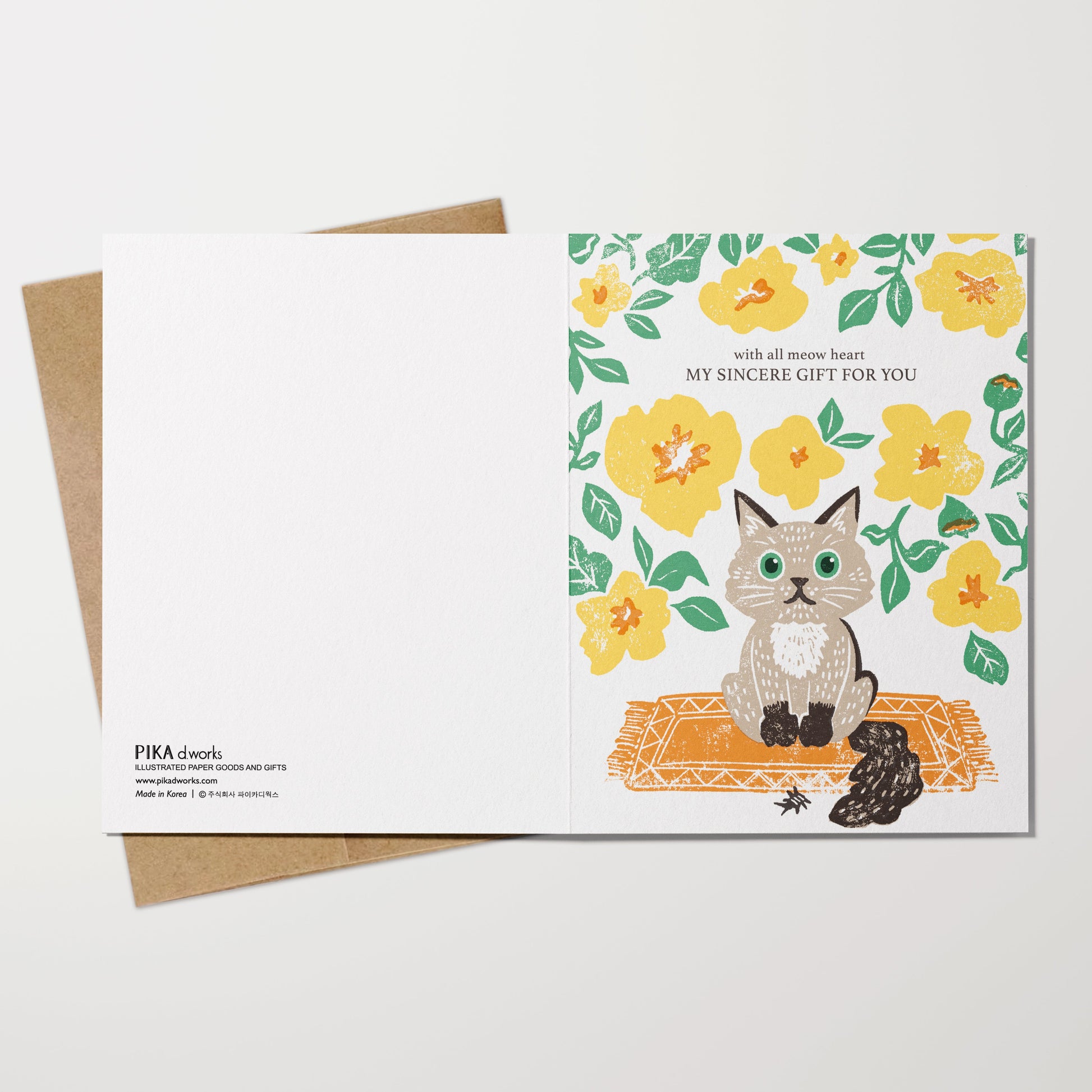 Greeting card with a cat illustration and floral design on a white background