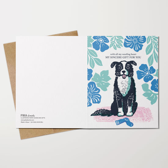 Greeting card with a dog illustration and floral design on a white background