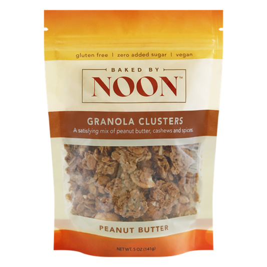Packaging of Baked by Noon Granola Clusters mix of peanut butter, cashews and spices.