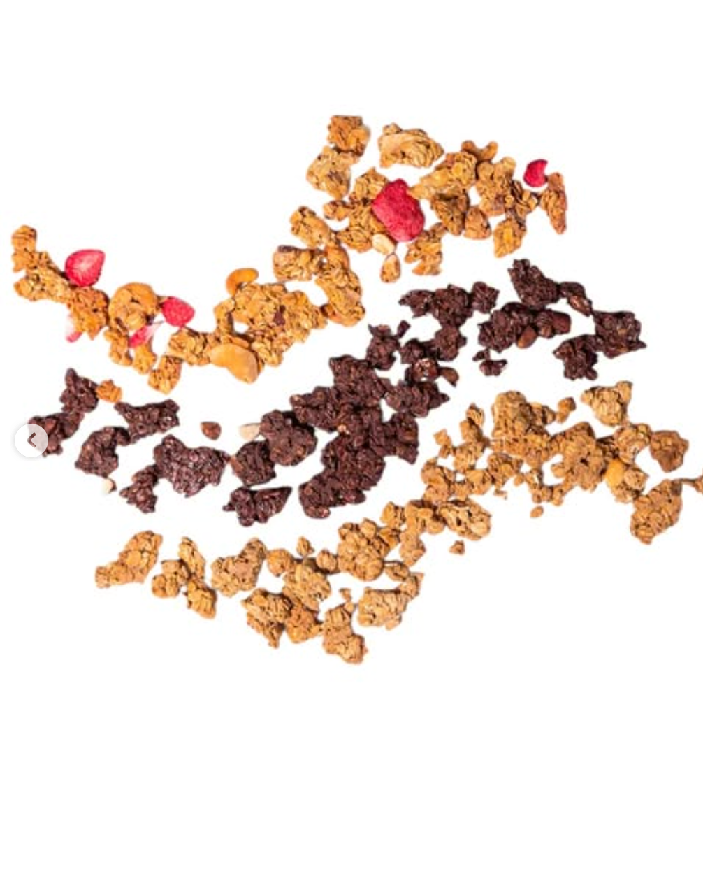 Assorted pet treats in different shapes and colors on a white background