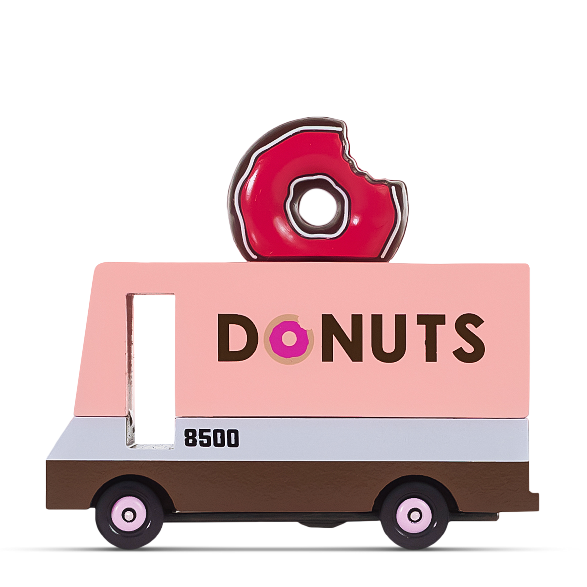 Pink wooden toy donut truck with a bite-mark donut decoration on top and the word ‘DONUTS’ printed on the side