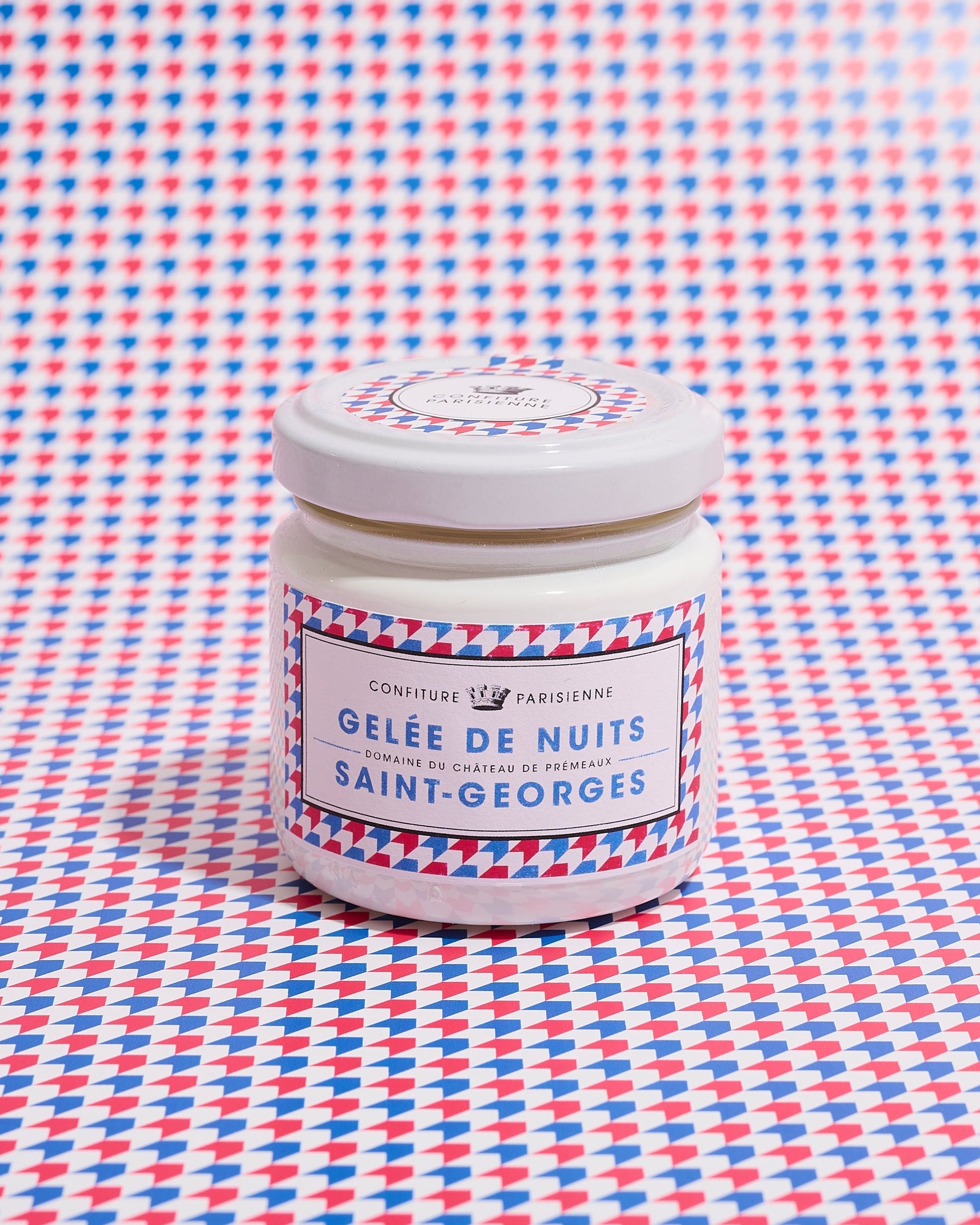 Jar of 'Geèle de Nuits Saint-Georges' on a patterned background