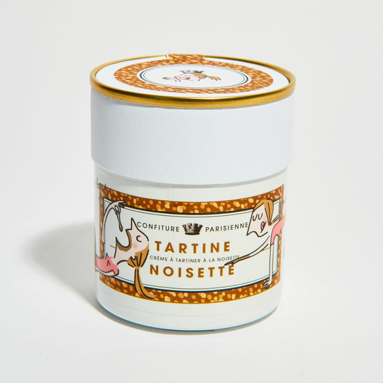 Tartine confectionery jar with decorative label on a white background