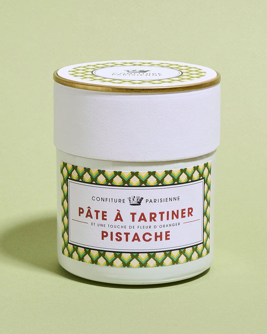 Jar of Pate a Tartiner Pistache on a light green background