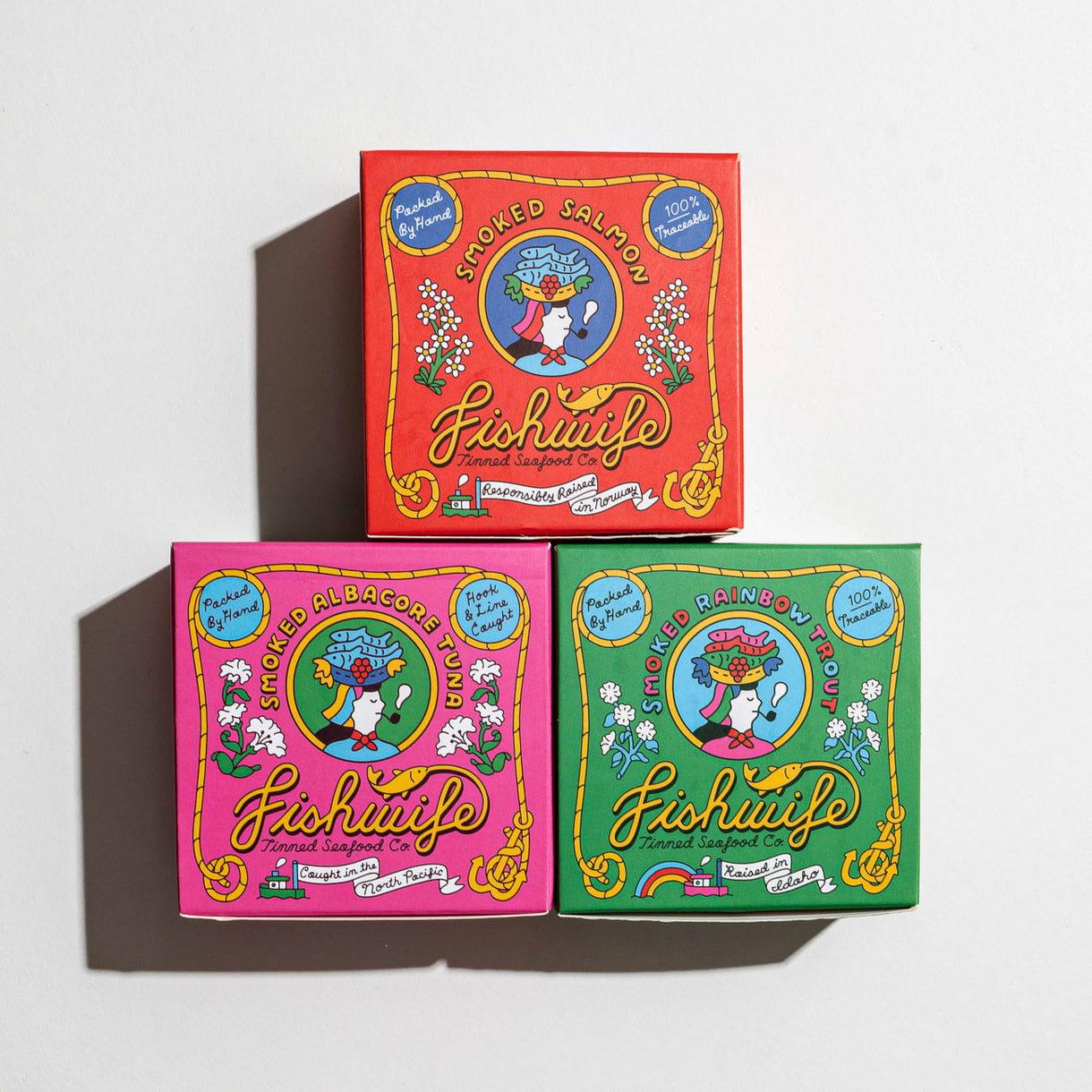 Three colorful boxes labeled 'Fishwife' on a white background