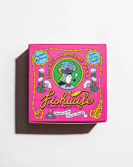 Pink box with smoked albacore tuna on a white background