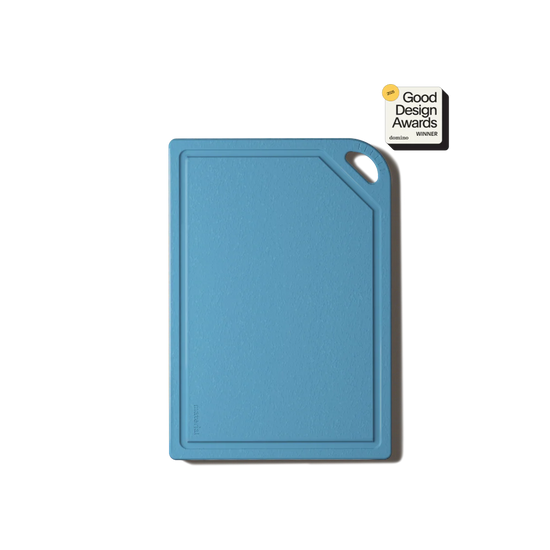Blue cutting board with Good Design Awards logo on a white background