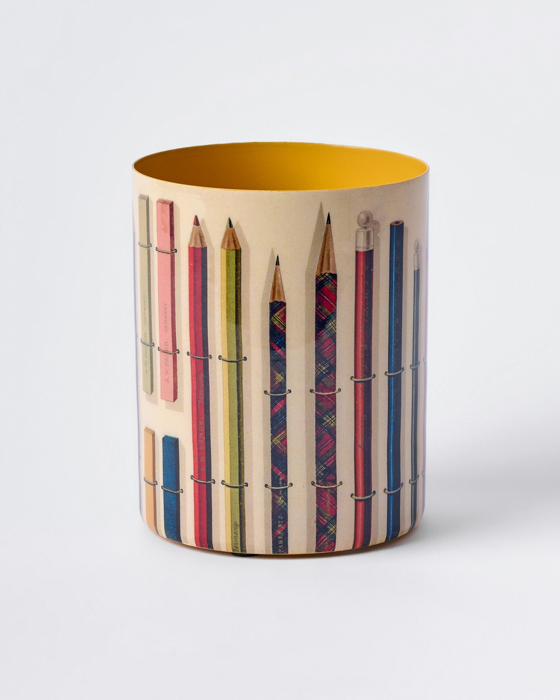 Cylindrical container with patterned pencils design on a white background