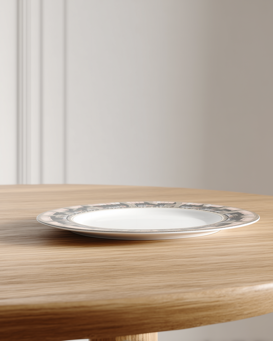 decorative plate on a wooden table with a plain background