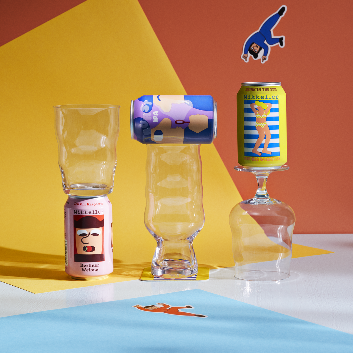 Mikkeller beer cans and glasses on a colorful background