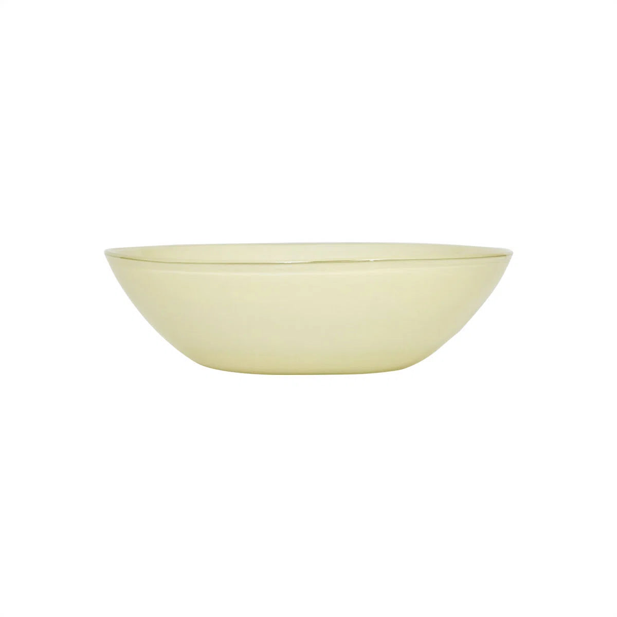 Cream-colored glass bowl on a white background