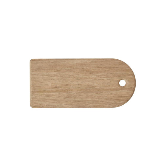 Wooden cutting board with a rounded handle laid flat on a white background