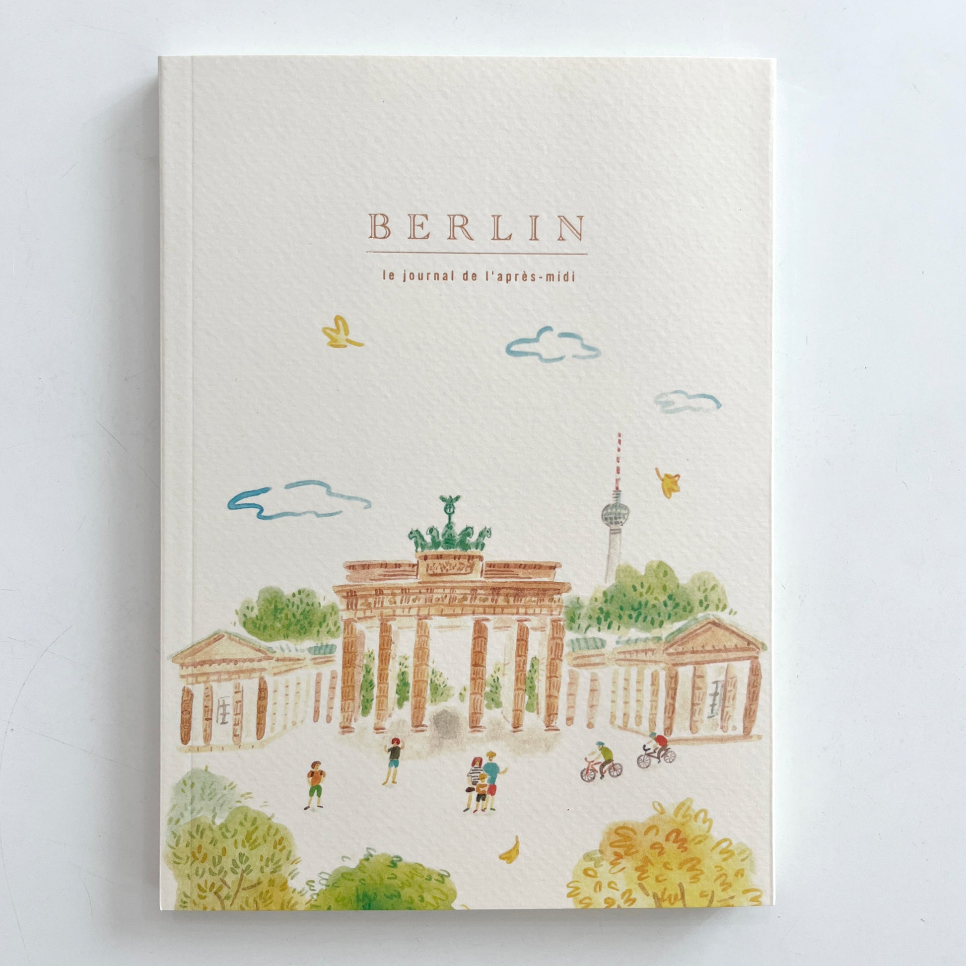 Notebook with illustrations of Berlin landmarks on a light gray background