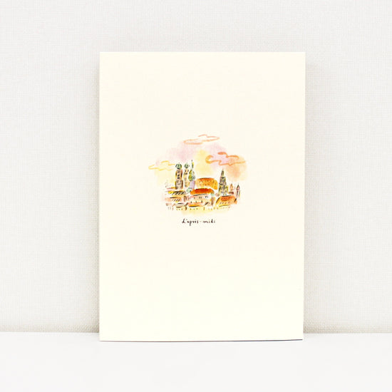 Back of the notebook with a colorful illustration of a cityscape on a white background