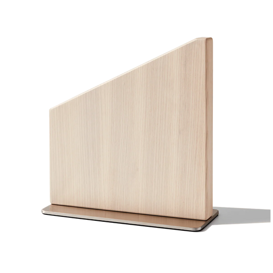 Wooden magnetic knife stand on a white background