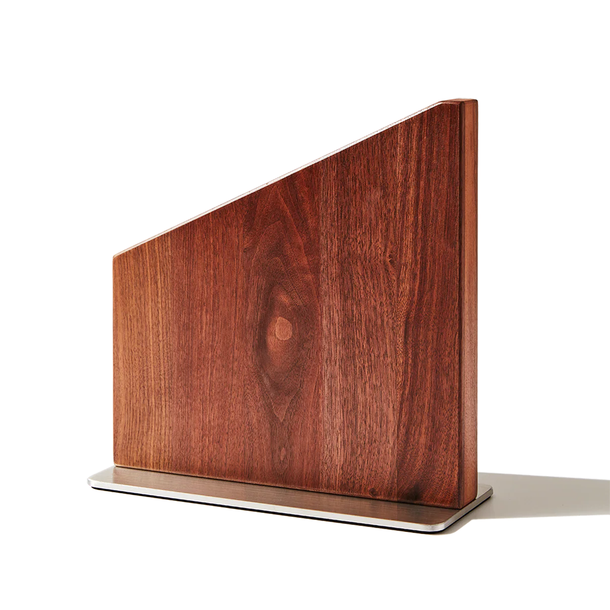 Wooden magnetic knife stand on a white background