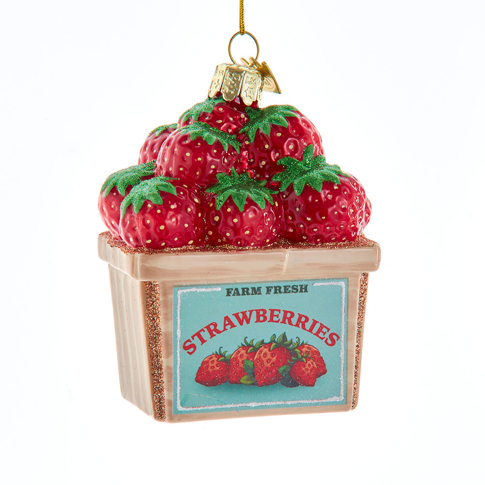 Decorative ornament of strawberries in a basket with 'Farm Fresh Strawberries' label on a white background