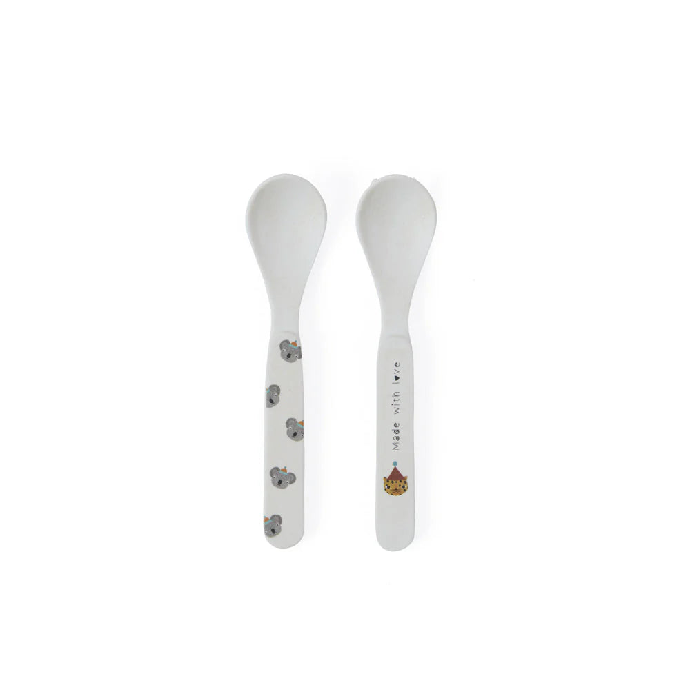 White baby spoon set on white background
