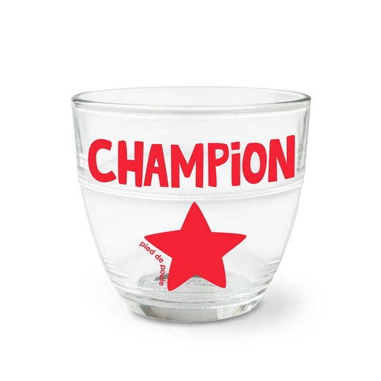 Clear glass with red 'CHAMPION' text and star on a white background