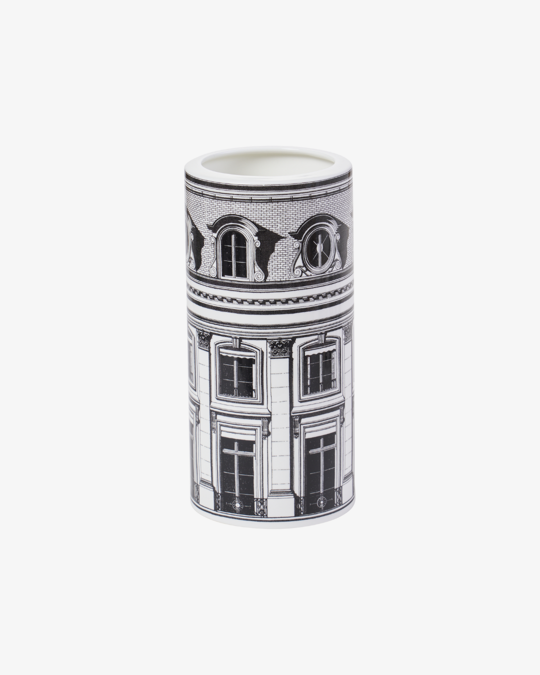 Cylindrical vase with black and white architectural design on a white background