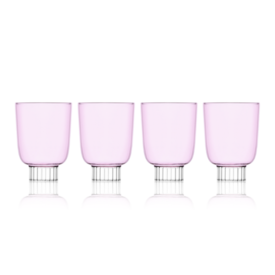 Four pink wine glasses with silver bases on a white background