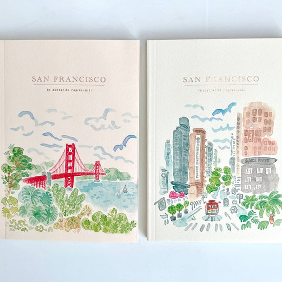 Two books with illustrations of San Francisco on a light blue background
