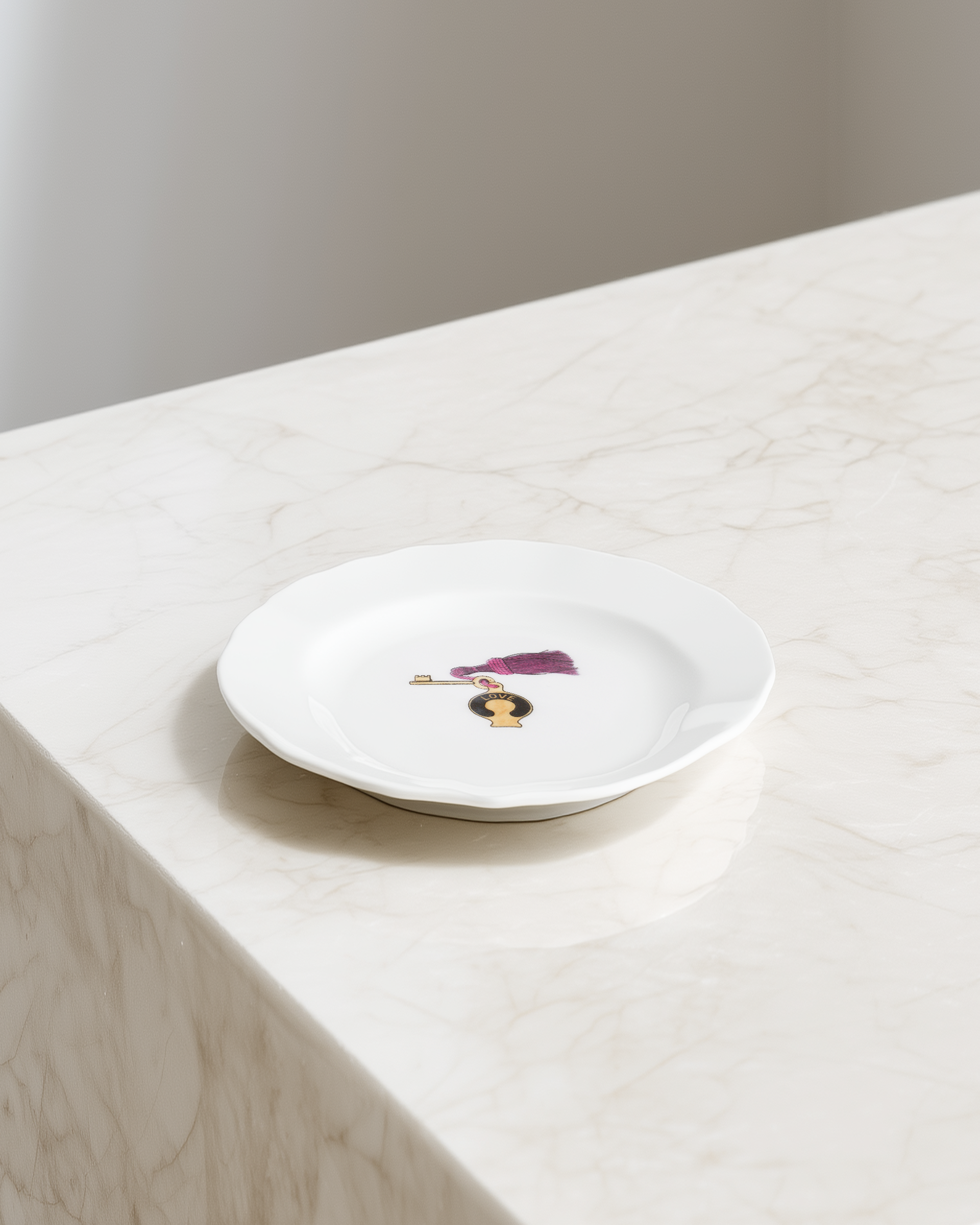 White plate with a decorative design on a light wooden surface