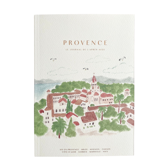Notebook cover of 'Provence' with a scenic illustration of a town and landscape.