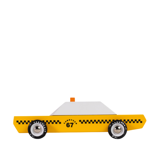 Toy taxi car with yellow body and black checkered pattern on a white background