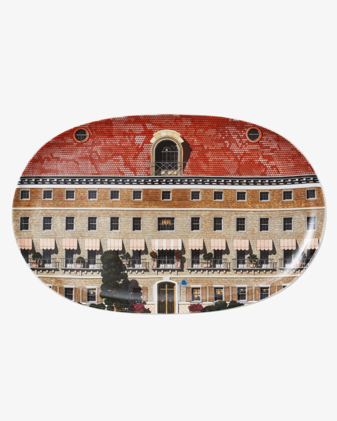 Decorative plate with a building design on a white background