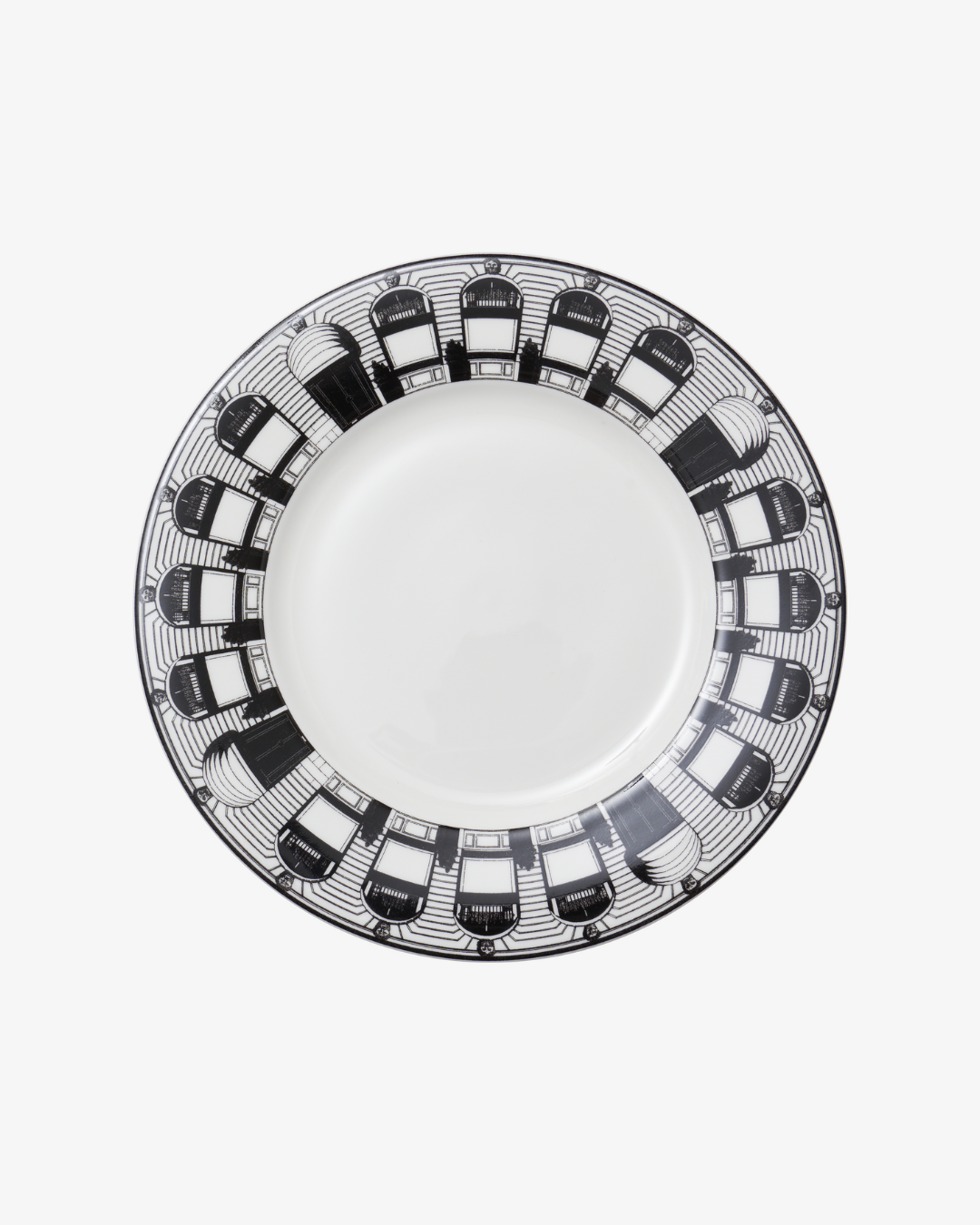 White plate with black geometric pattern on a white background