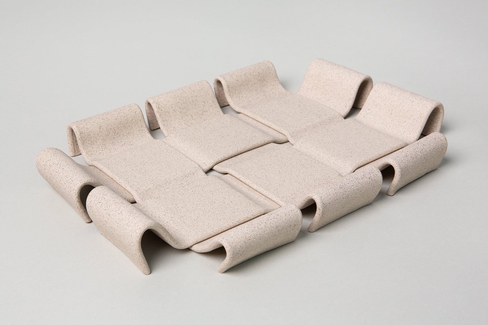 Beige modular sofa on a light gray background