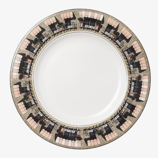 Decorative plate with a patterned rim on a white background