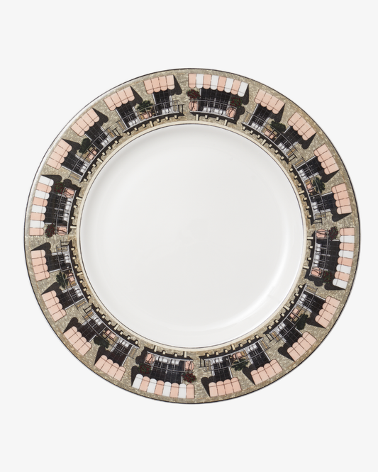 Decorative plate with a patterned rim on a white background