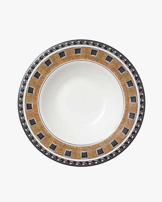 Decorative ceramic bowl with a brown and black pattern on a white background